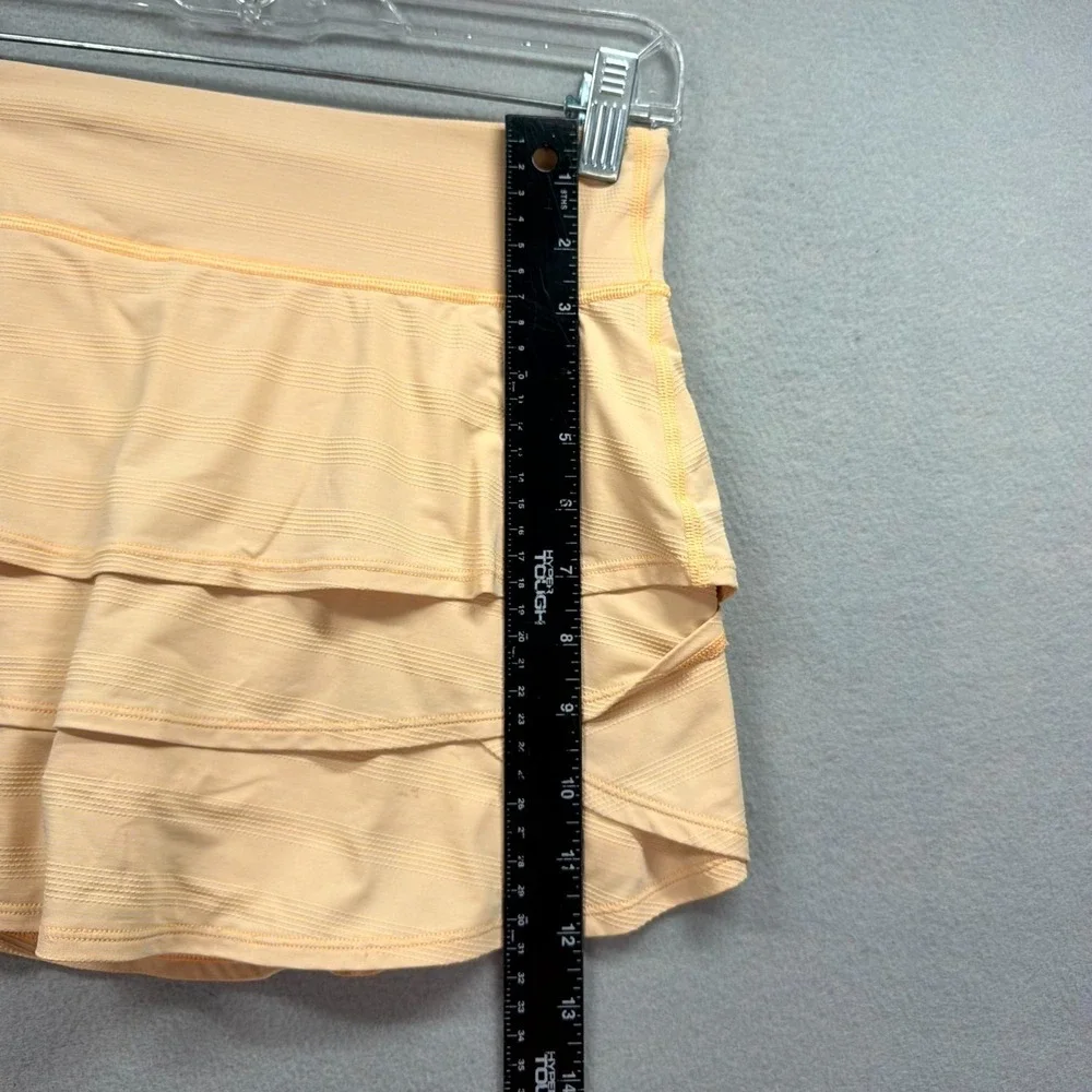 Athleta Girl Swing Mini Skort XL/14 Light Peach Golf Tennis Performance Ruffled